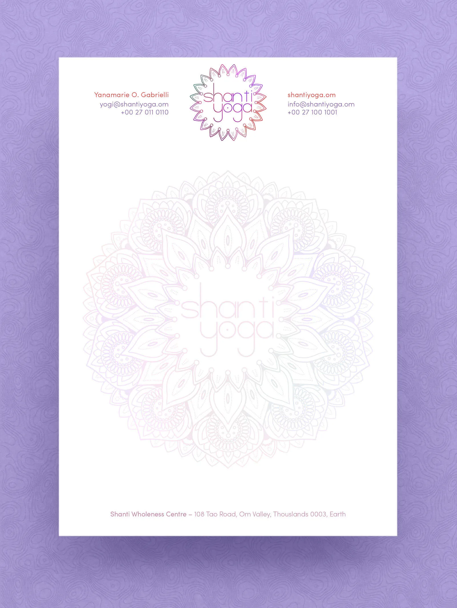 The Shanti Yoga letterhead. The mandala mark sits centred at the head between two contact blocks; a much larger version of the same mandala is printed almost white across the middle of the sheet, with a single line of address type at the foot.